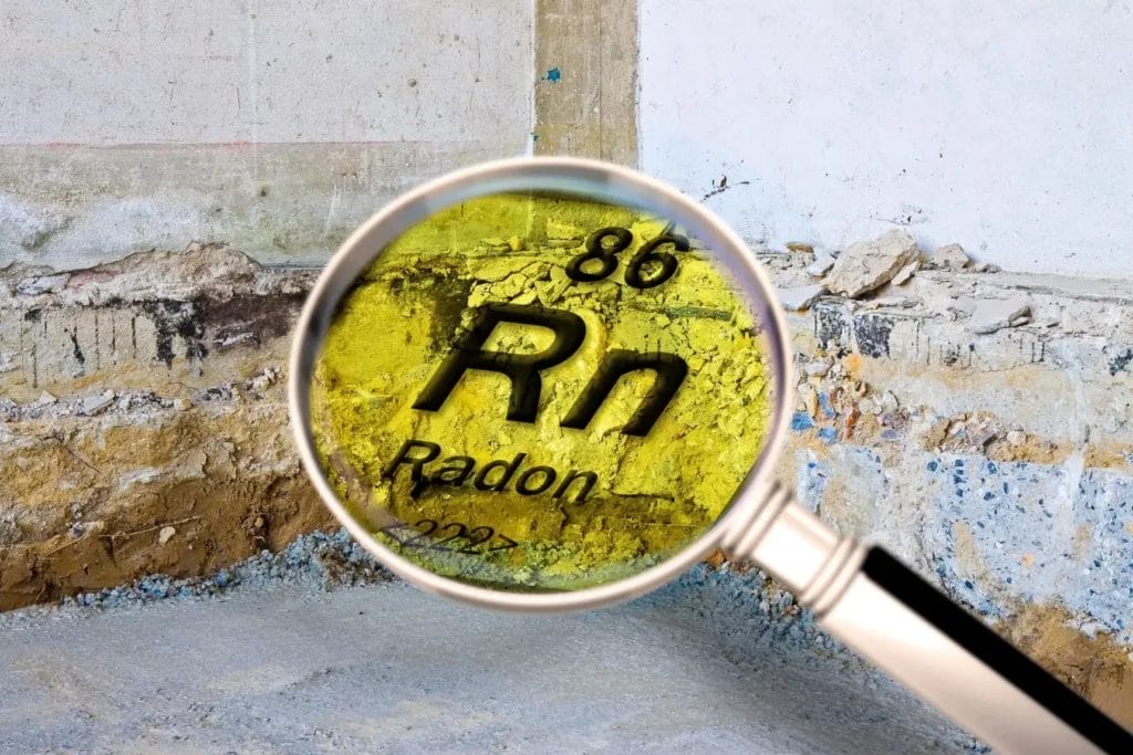 Magnified image of radon gas symbol on a textured surface.