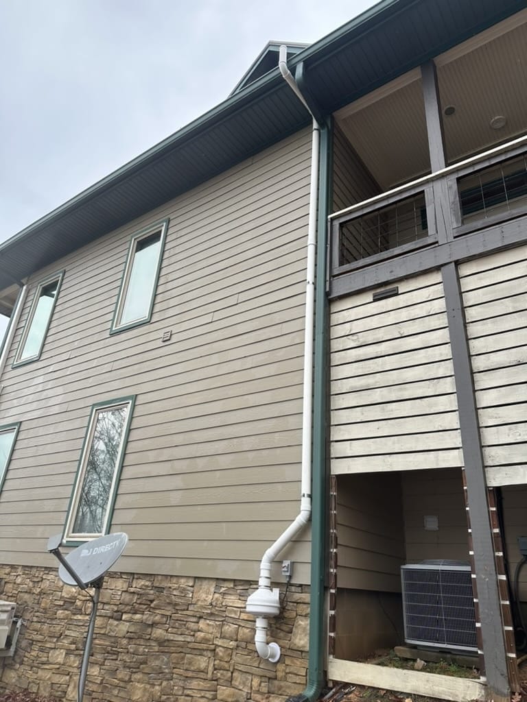 Home exterior with Radon constant monitoring for radon mitigation system
