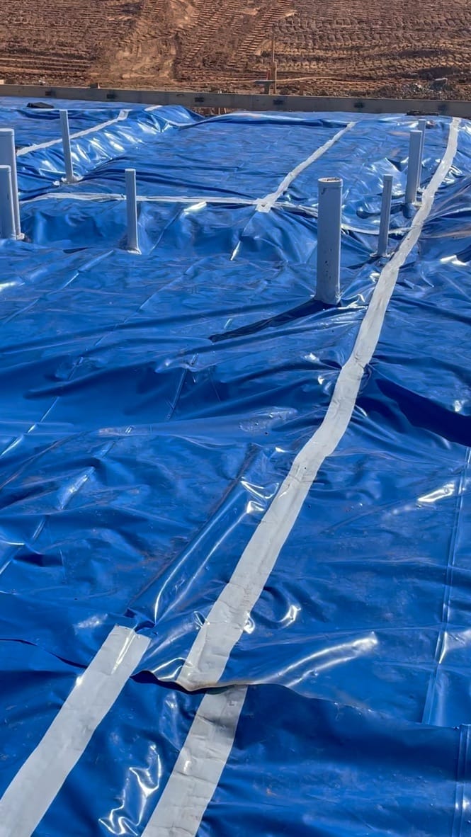 Commercial building basement with vapor barrier equipment
